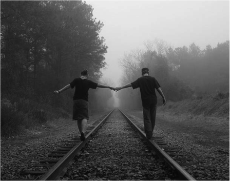 LOVERS ON RAILROAD TRACKS