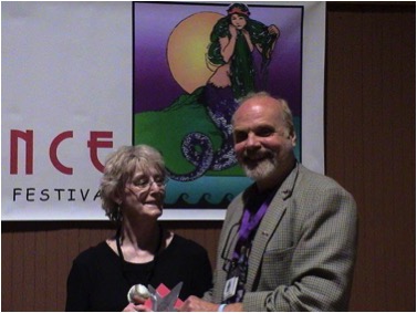 Elizabeth English presents the 2004 Moondance Film Festival Screenplay Award to Arthur Kanegis